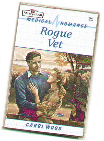 cover of a book, medical romance, rogue vet, by carol wood, picture of guy, girl and dog