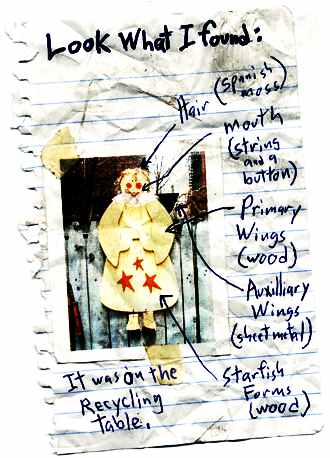 Angel with primary wings, secondary wings, spanish moss hair, string mouth, starfish on dress.